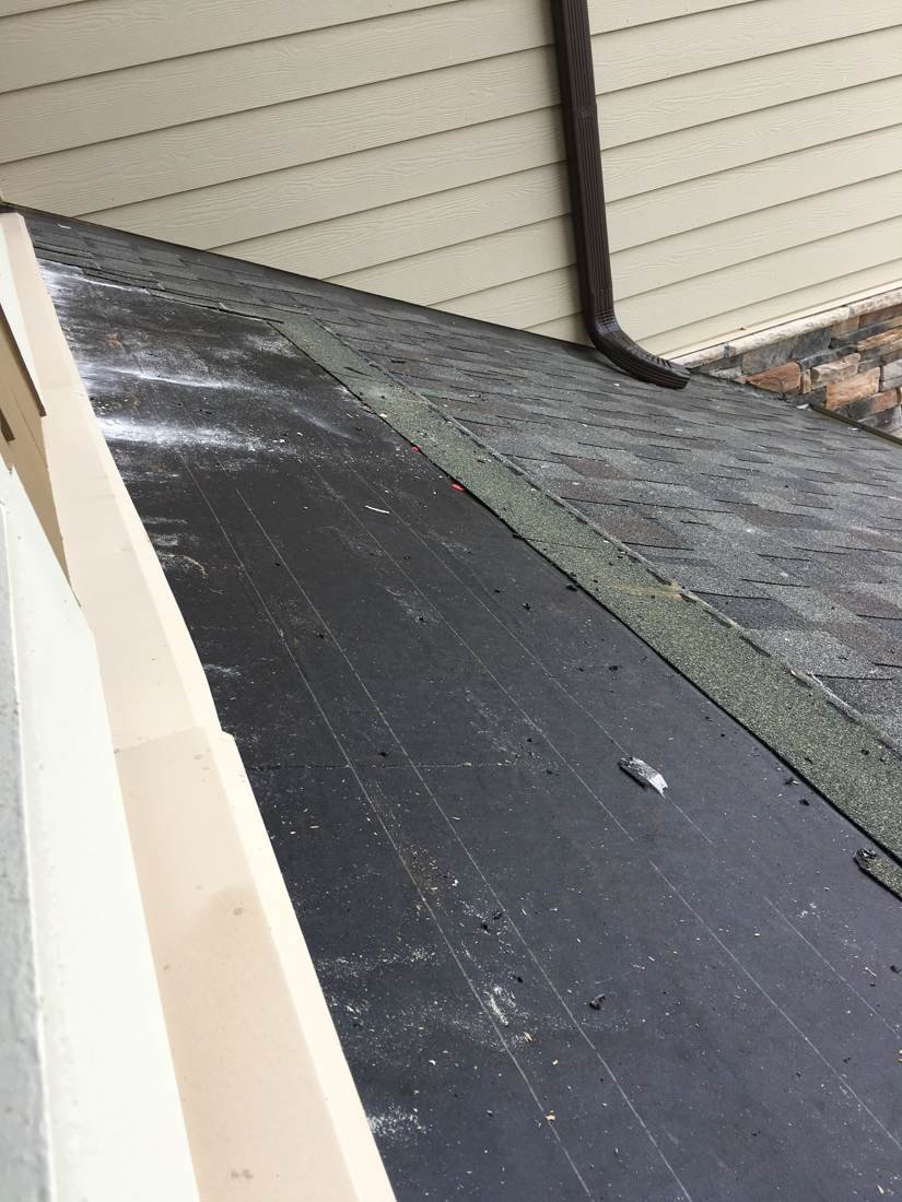 Cement and mortar staining on new-construction architectural shingles in Gallatin, TN