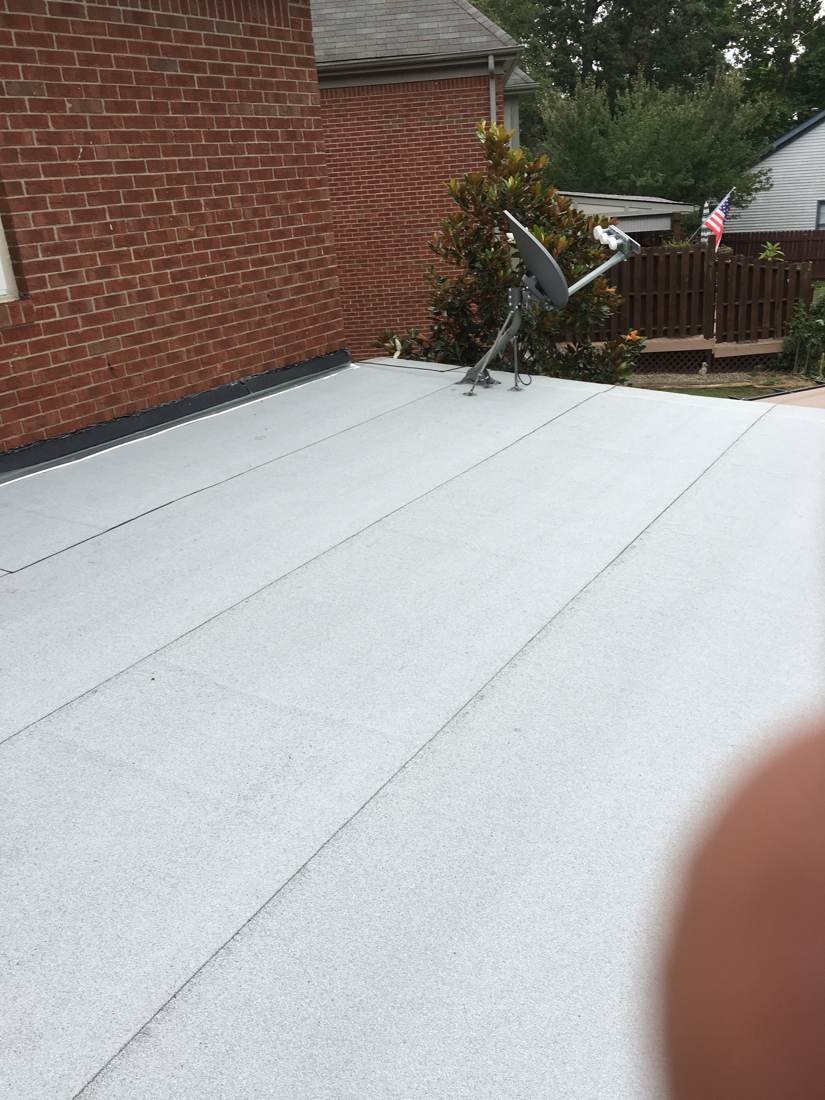 Finished flat roof membrane installed on a residential low-slope roof, Tennessee