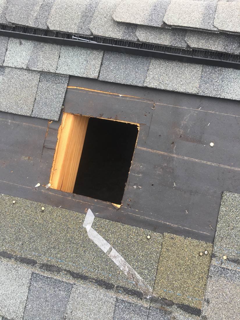 Close-up of a roof deck section cut out and repaired with new plywood, Tennessee