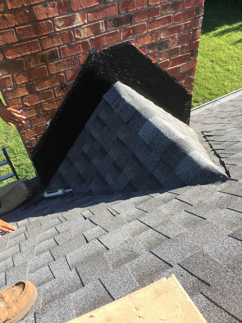 Finished chimney cricket tied into the shingle roof at a brick chimney, Murfreesboro TN