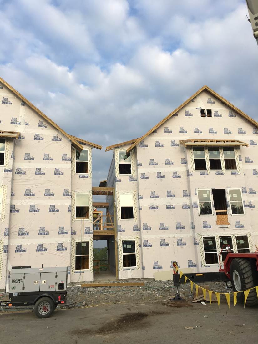 New-construction apartment building with house wrap and window openings near downtown Nashville, Tennessee